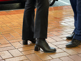 Black women's ankle boots, European made in Portugal. Mid heel height with zipper entry. Quality leather uppers, comfortable dress boot with a square toe.