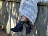 European ankle boots hand made in Portugal, embroidered design on the ankle, along with ribbed leather detail. Western style bootie in gray