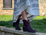 European ankle boots hand made in Portugal, embroidered design on the ankle, along with ribbed leather detail. Western style bootie in Bordeaux 