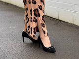 Comfortable, quality European women's stiletto sandal in suede leather. Quirky chain link detailing across the toe bar. Wedding or special occasion shoe in black.