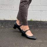 Quality comfortable Mary-Jane women's court shoes/sandal. Low heel with a supportive footbed. In black.
