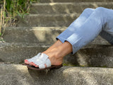Classic European slide with fringe detail. Made in Spain from quality leathers, comfortable women's sandals/slides. In off white.