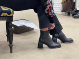 Black women's ankle boots, European made in Portugal. Mid heel height with zipper entry. Quality leather uppers, comfortable dress boot with a square toe.