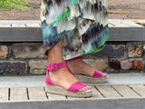 Flat Spanish espadrille sandal. Quality women's sandals and shoes made from suede leather in fuchsia fushia fuxia. Buckle ankle strap, jute sole unit.