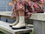 European ankle boots hand made in Portugal from quality leather. Off white/beige pull-on combat boots with a high shine leather. Elasticated gussets. Comfortable women's boots with chunky robust sole unit.